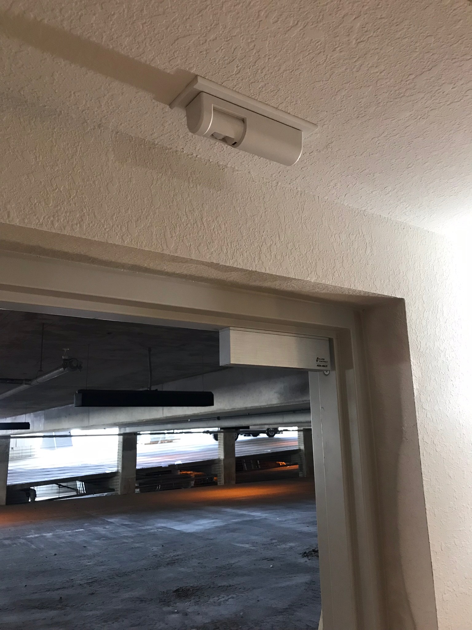 Single maglock installed on parking garage